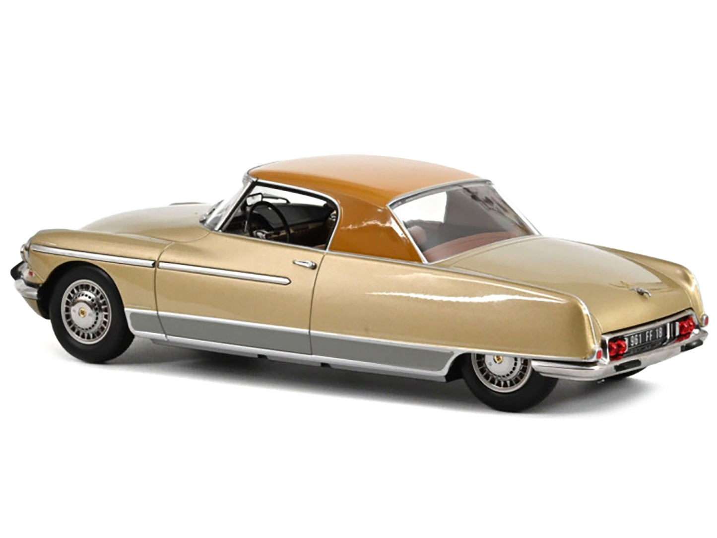 Brand new 1/18 scale diecast car model of 1964 Citroen DS 19 Le Dandy Beige Metallic with Brown Top die cast model car by Norev.
Brand new