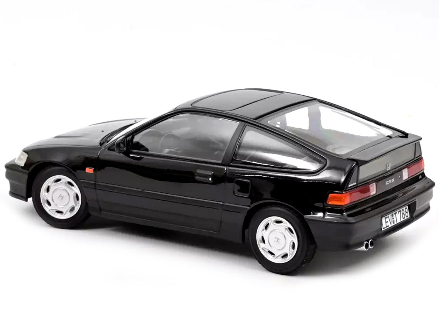 Brand new 1/18 scale diecast car model of 1990 Honda CRX Black die cast model car by Norev.
Brand new box.
Real rubber
