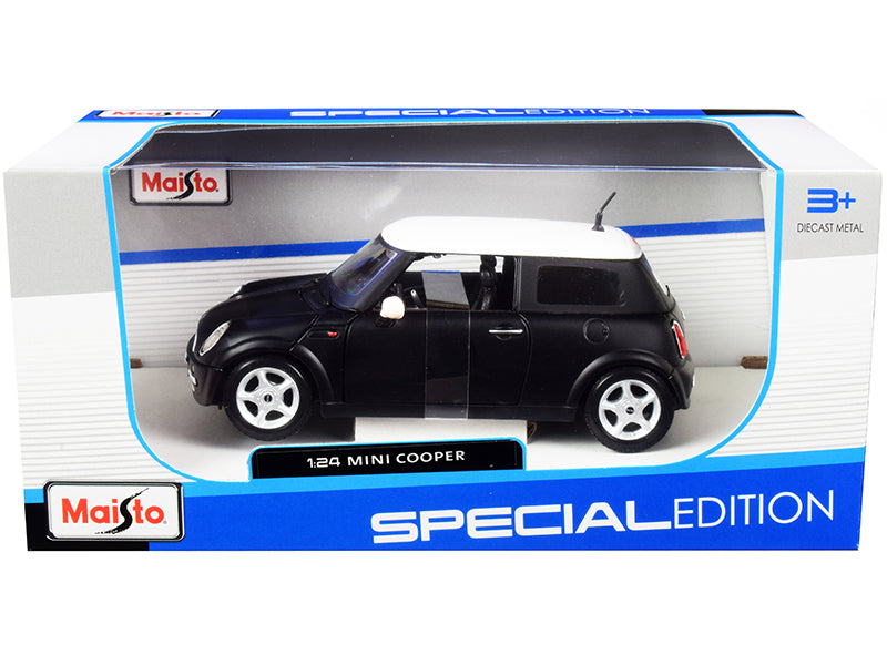Brand new 1/24 scale diecast car model of Mini Cooper Matt Black with White Top die cast model car by Maisto.
Brand new