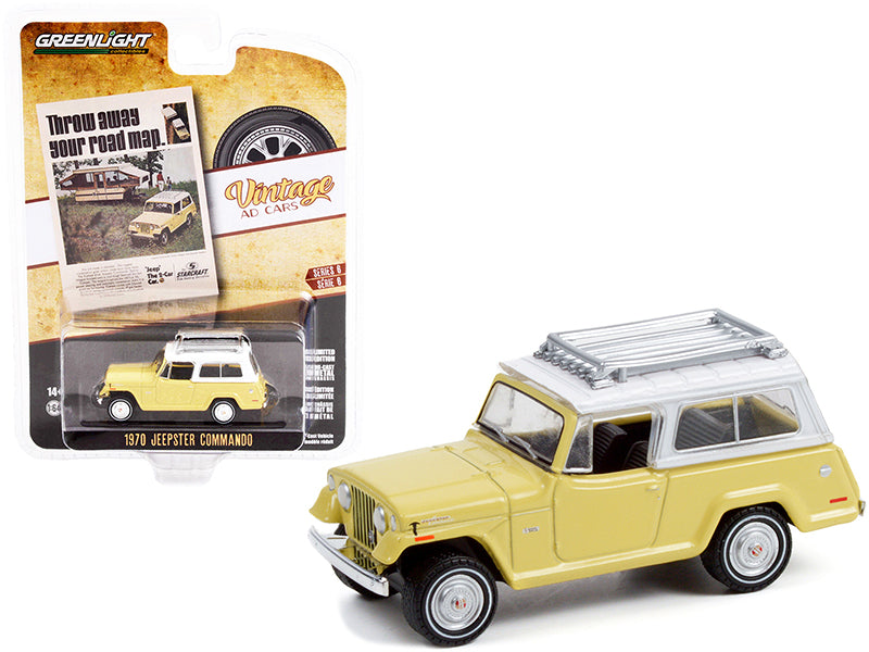 Brand new 1/64 scale diecast car model of 1970 Jeep Jeepster Commando with Roof Rack Yellow with White Top Throw Away Your Road Map Vintage 