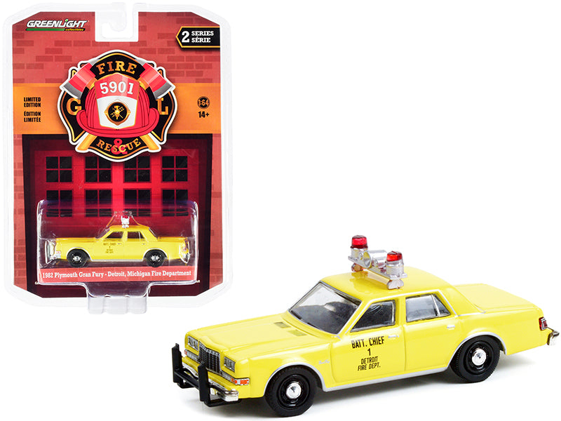 1982 Plymouth Gran Fury Yellow Diecast Model Race Car 