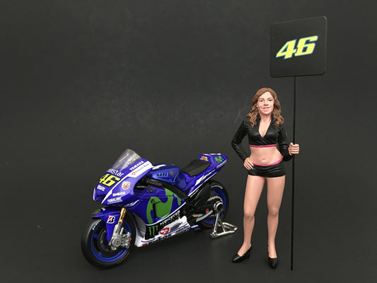Paddock Girl Figure For 1:18 Scale Models by American Diorama.
Packed in a blister pack.
Only one figure with a sign w