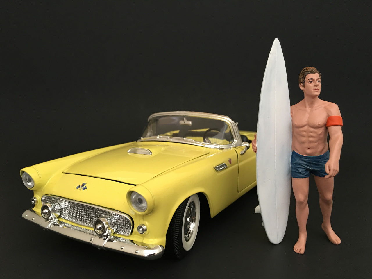 Surfer Greg Figure For 1:24 Scale Models by American Diorama.
 Comes in a blister pack.
 Only one figure with a surf board