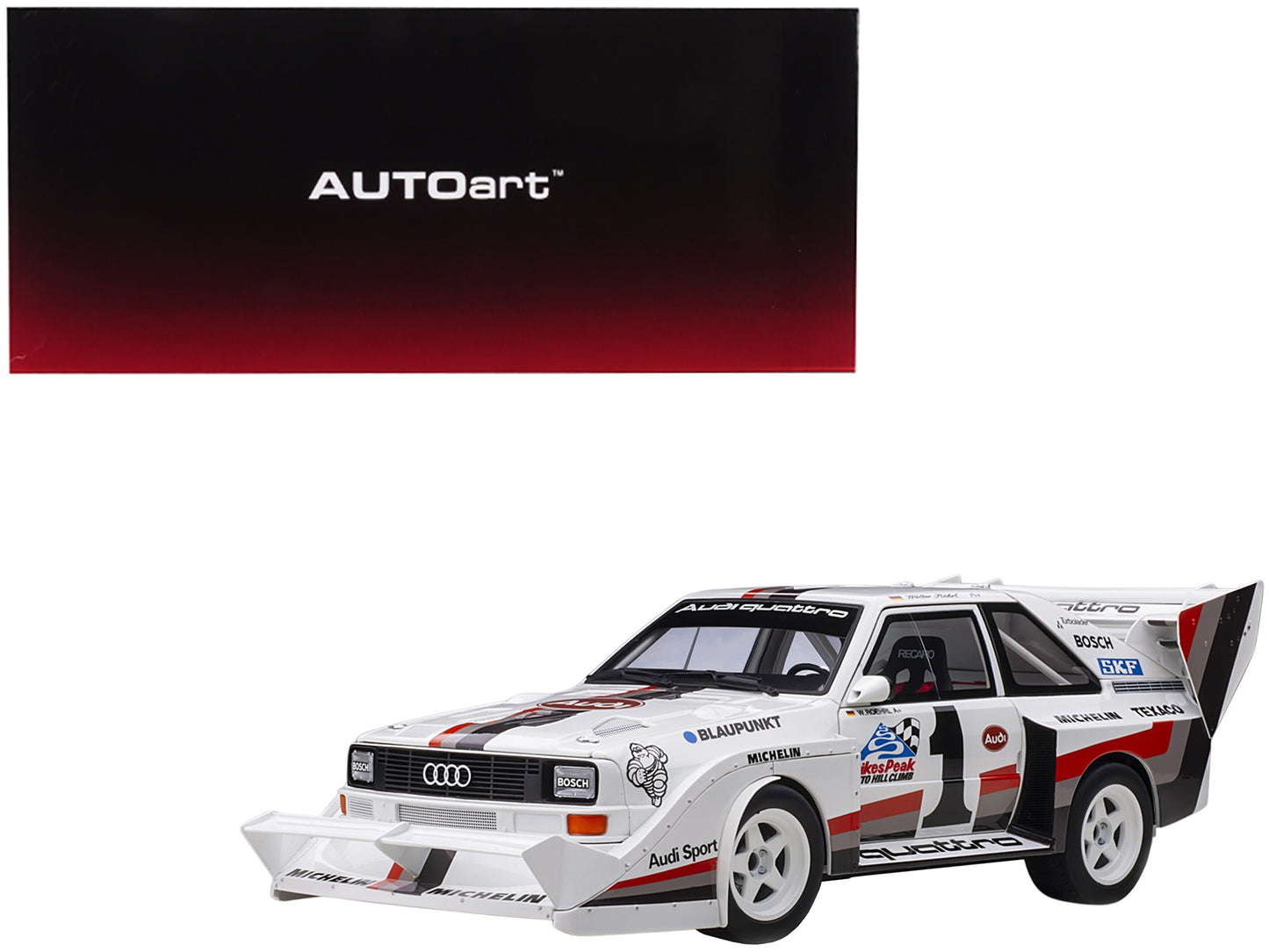 Brand new 1/18 scale car model of Audi Quattro S1 #1 Walter Roehrl Winner Pikes Peak (1987) model car by Autoart.
Brand