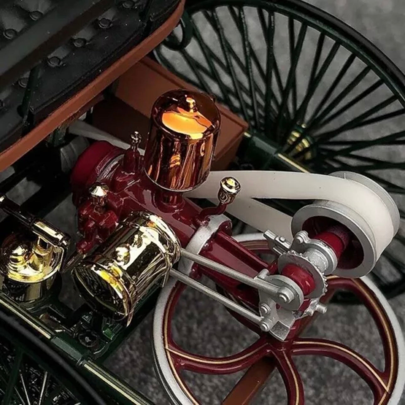 A detailed closeup of the engine in a vintage Mercedes Benz diecast model car