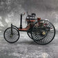 A diecast scale replica model of an 1886 Benz Patent Motorwagen car
