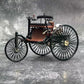 A diecast scale replica model of an 1886 Benz Patent Motorwagen car